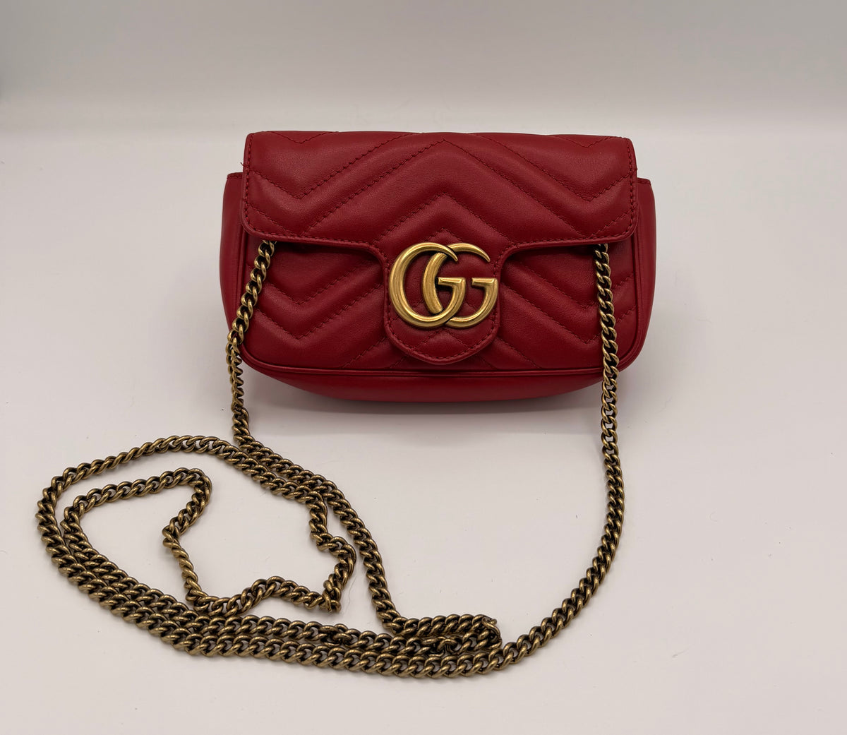 Gucci GG Marmont Super Mini Matelassé Leather Bag – Red
