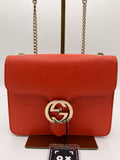 Gucci Dollar Calfskin Small Interlocking G Shoulder Bag in Orange Pebbled Leather