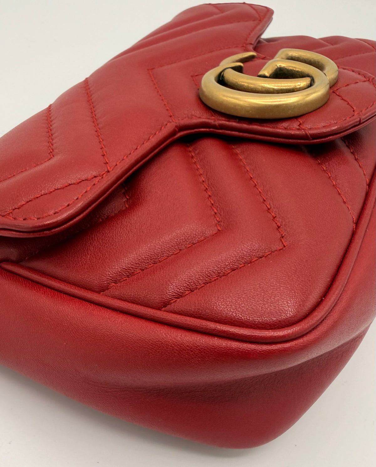 Gucci GG Marmont Super Mini Matelassé Leather Bag – Red